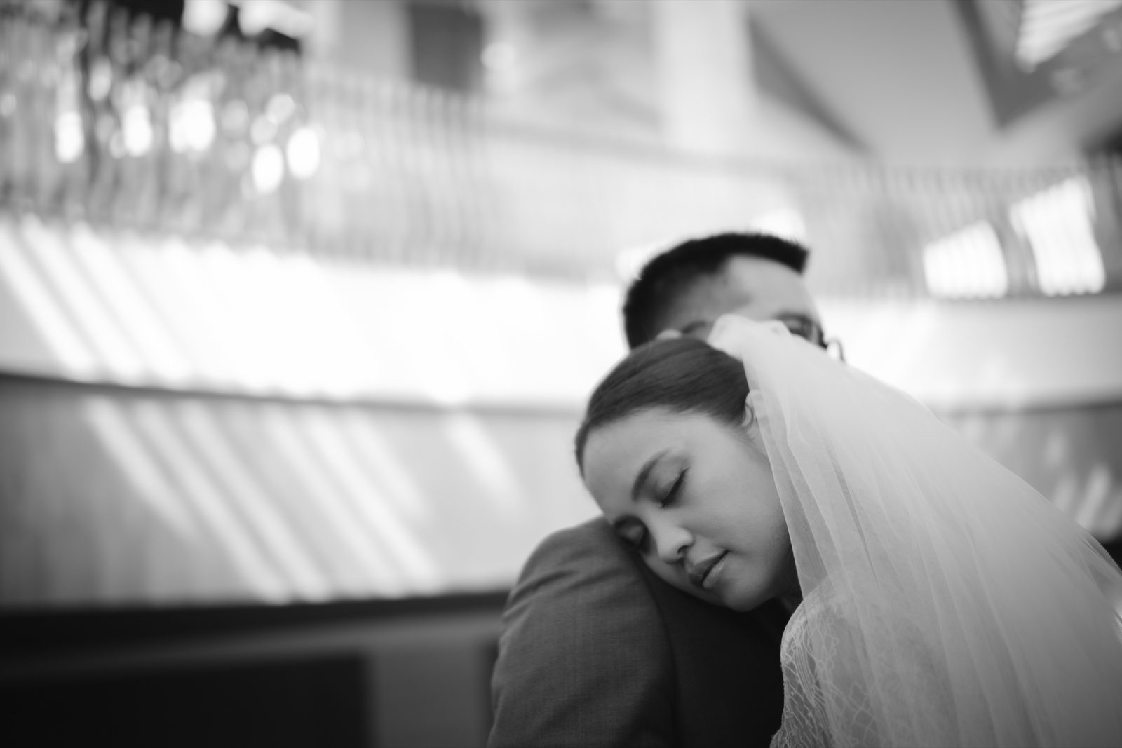 A couple in a tender black and white embrace