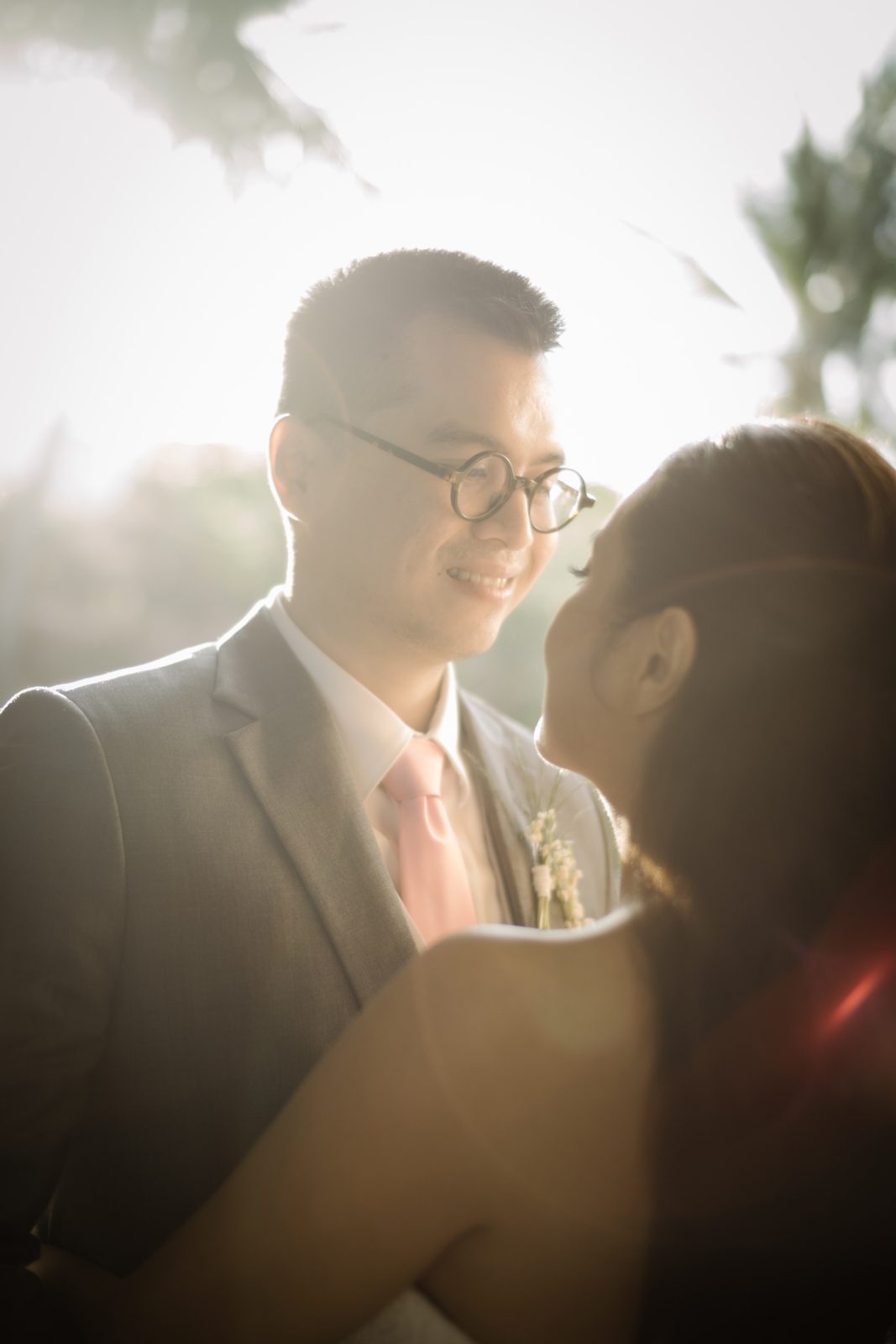 A couple sharing a quiet moment in golden light